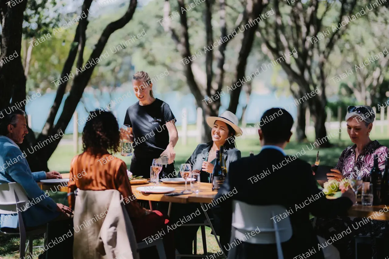 Business professionals dine outdoors at Waiheke vineyard 11