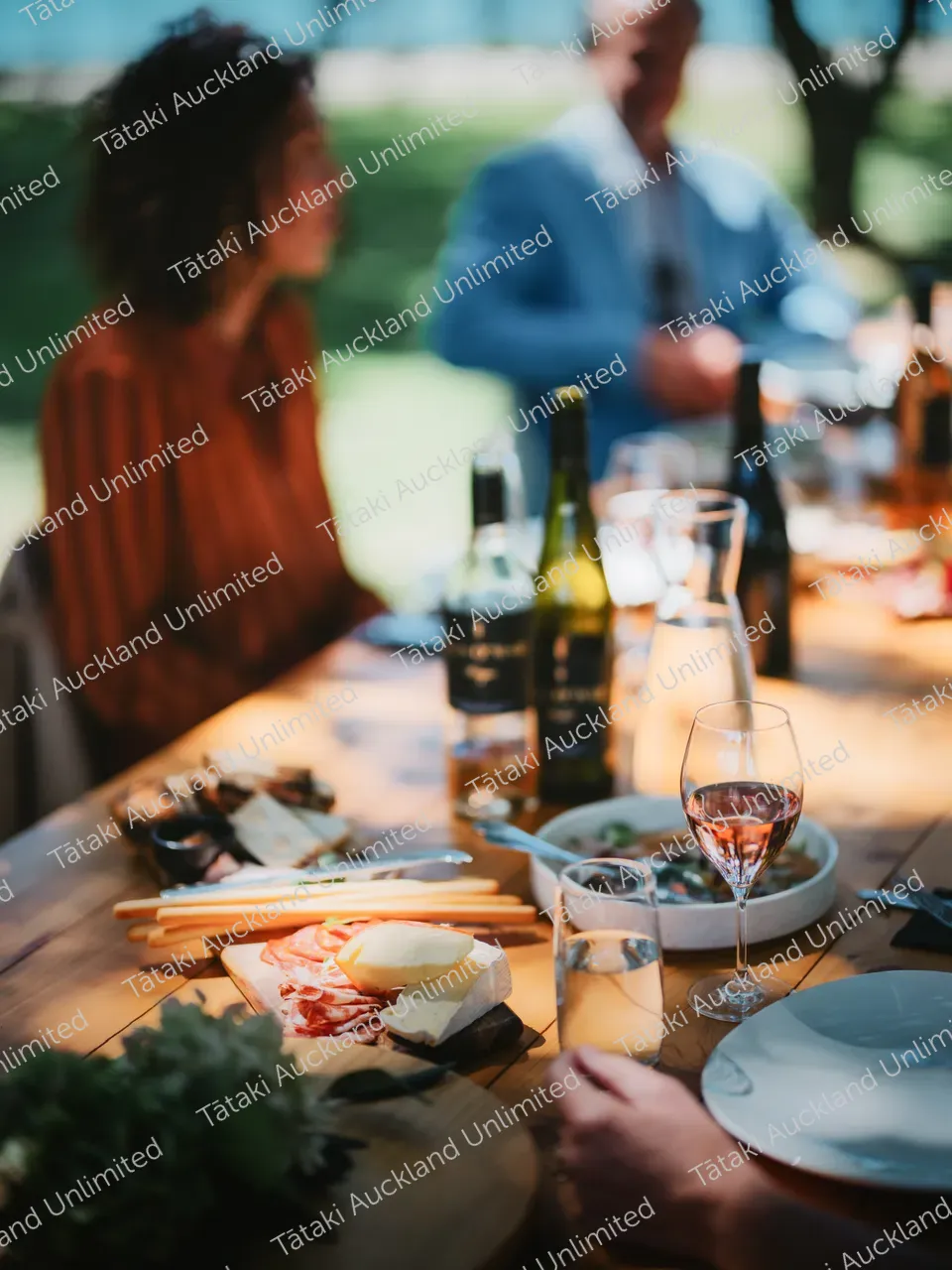 Business professionals dine outdoors at Waiheke vineyard 6