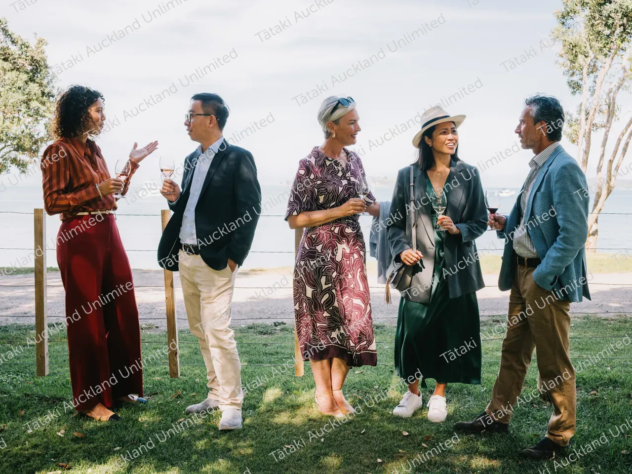  A group of business professionals wine tasting at a Waiheke vineyard 4
