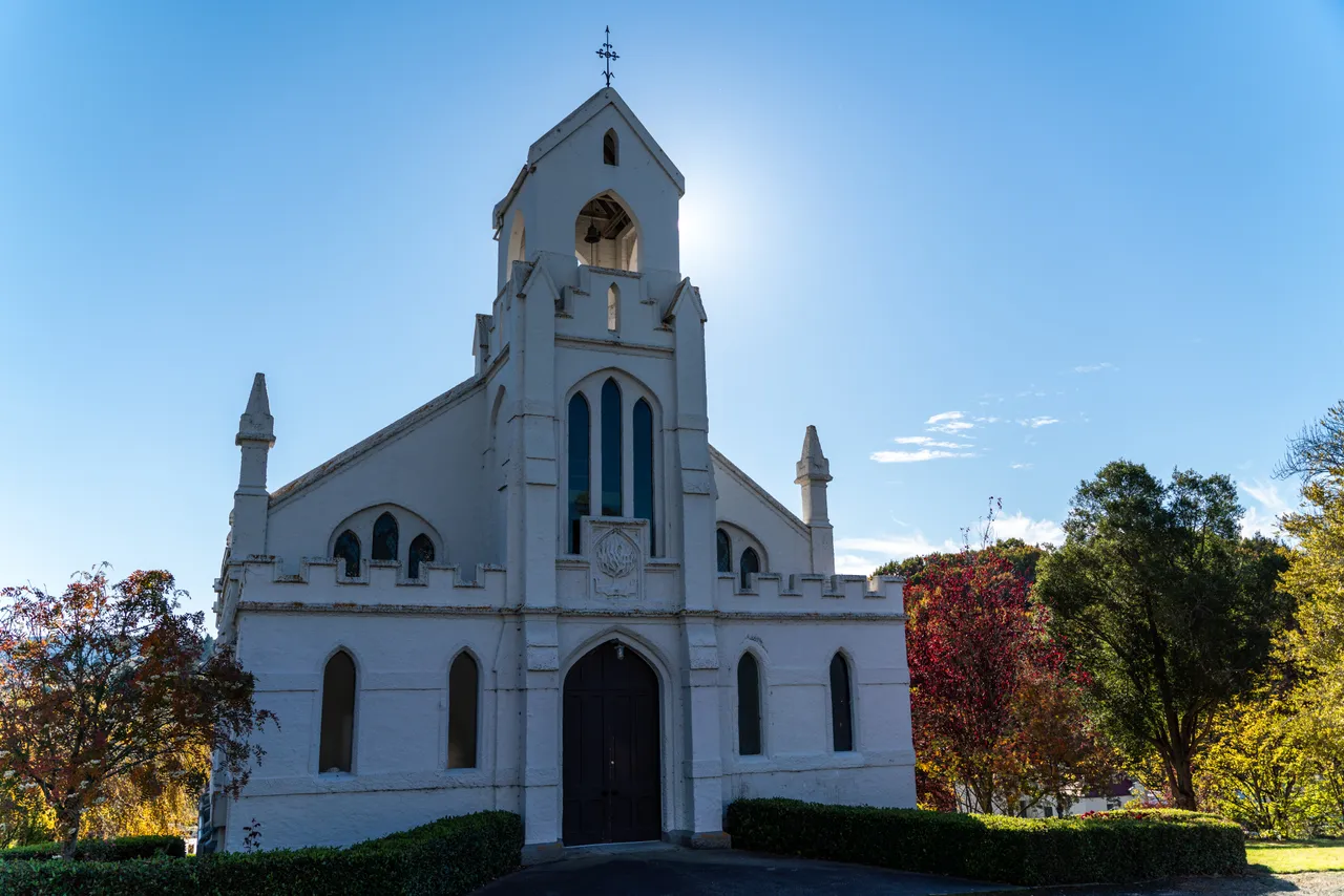 White church and small hedge