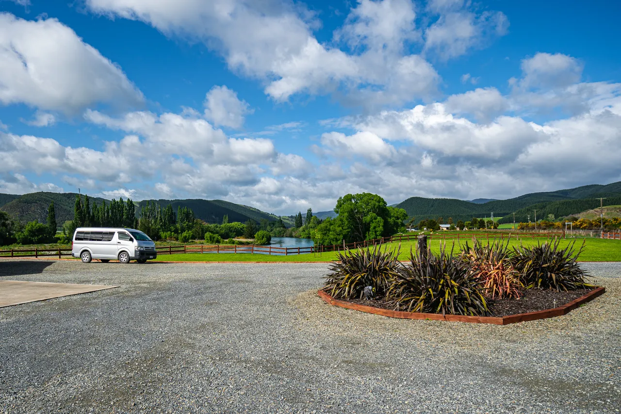 Gravel driveway and van