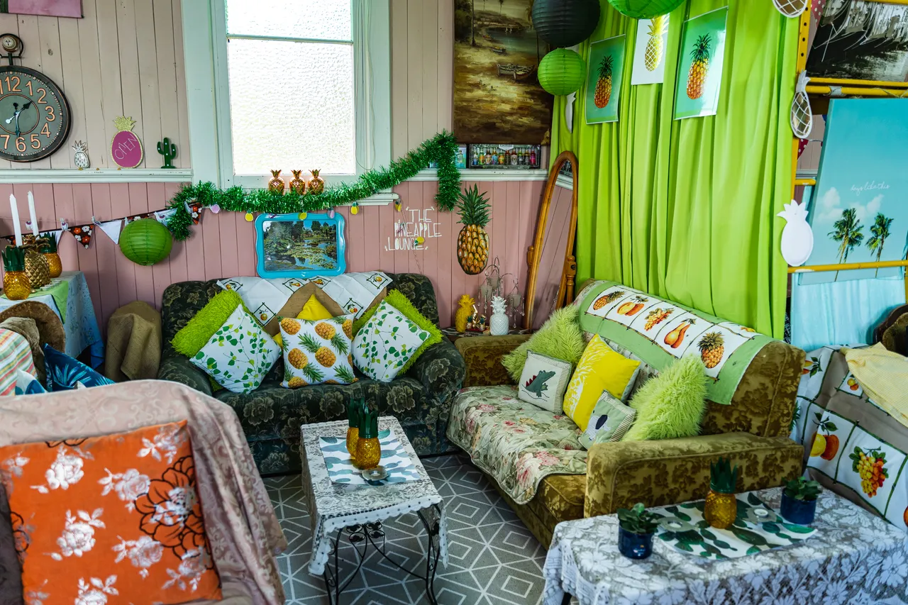 Lounge full of artwork of pineapples