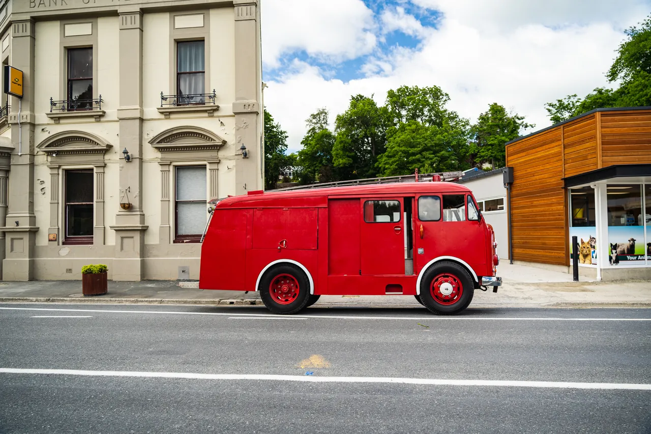 Old firetruck parked on street