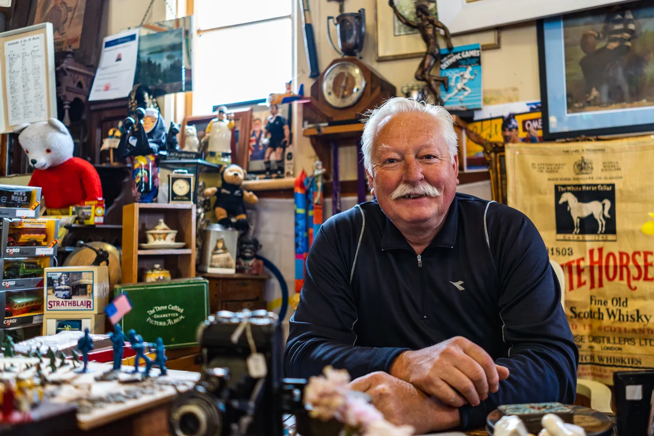 John in antique shop