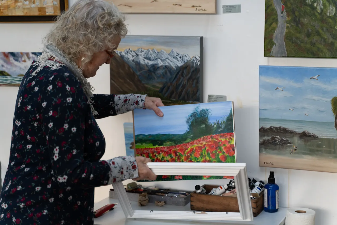 Beth Linklater with paintings
