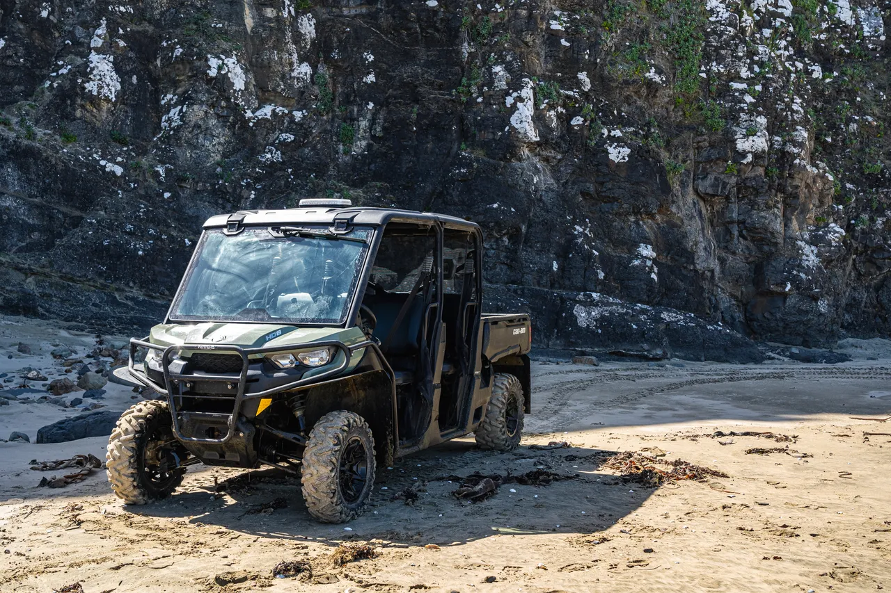 Side by side parked on the beach