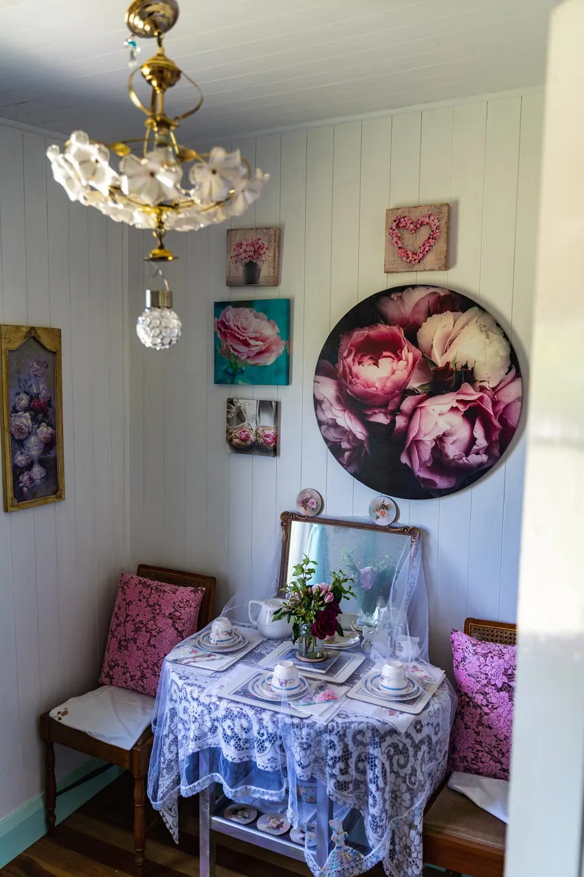 Table and artwork of roses 