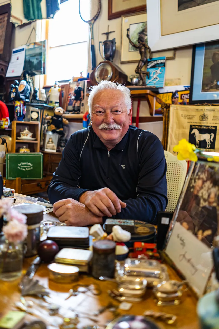John in antique shop