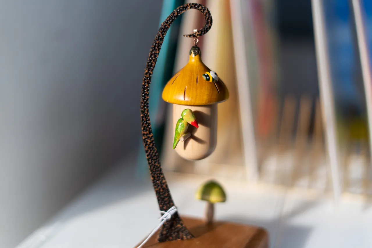 Artwork of bird and acorn