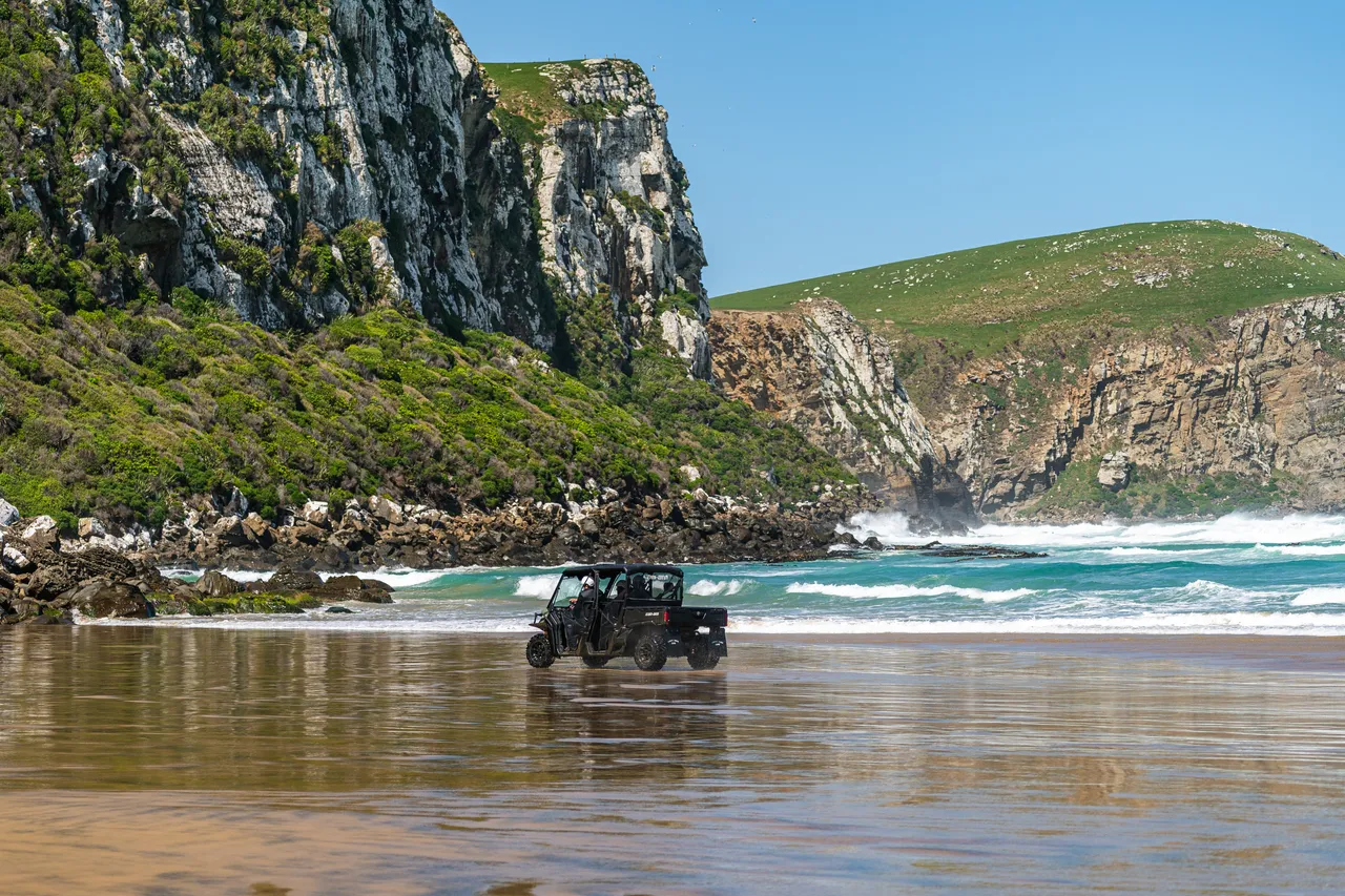 Side by side driving on beach