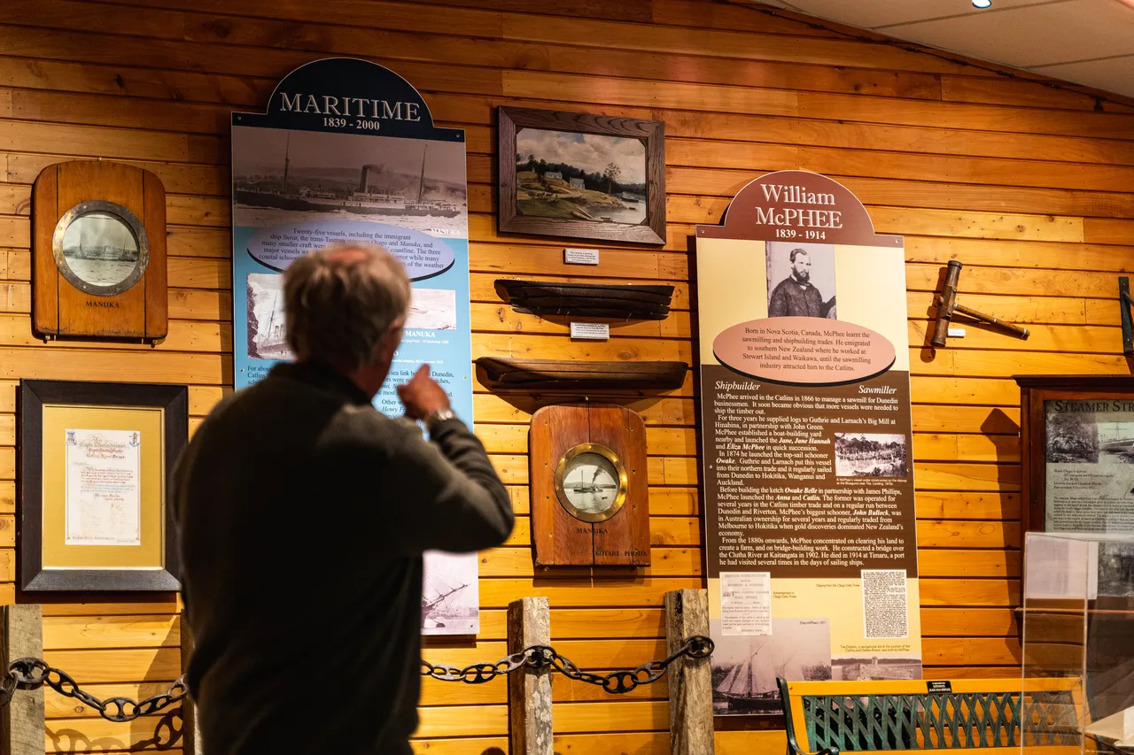 Mike McPhee with museum display