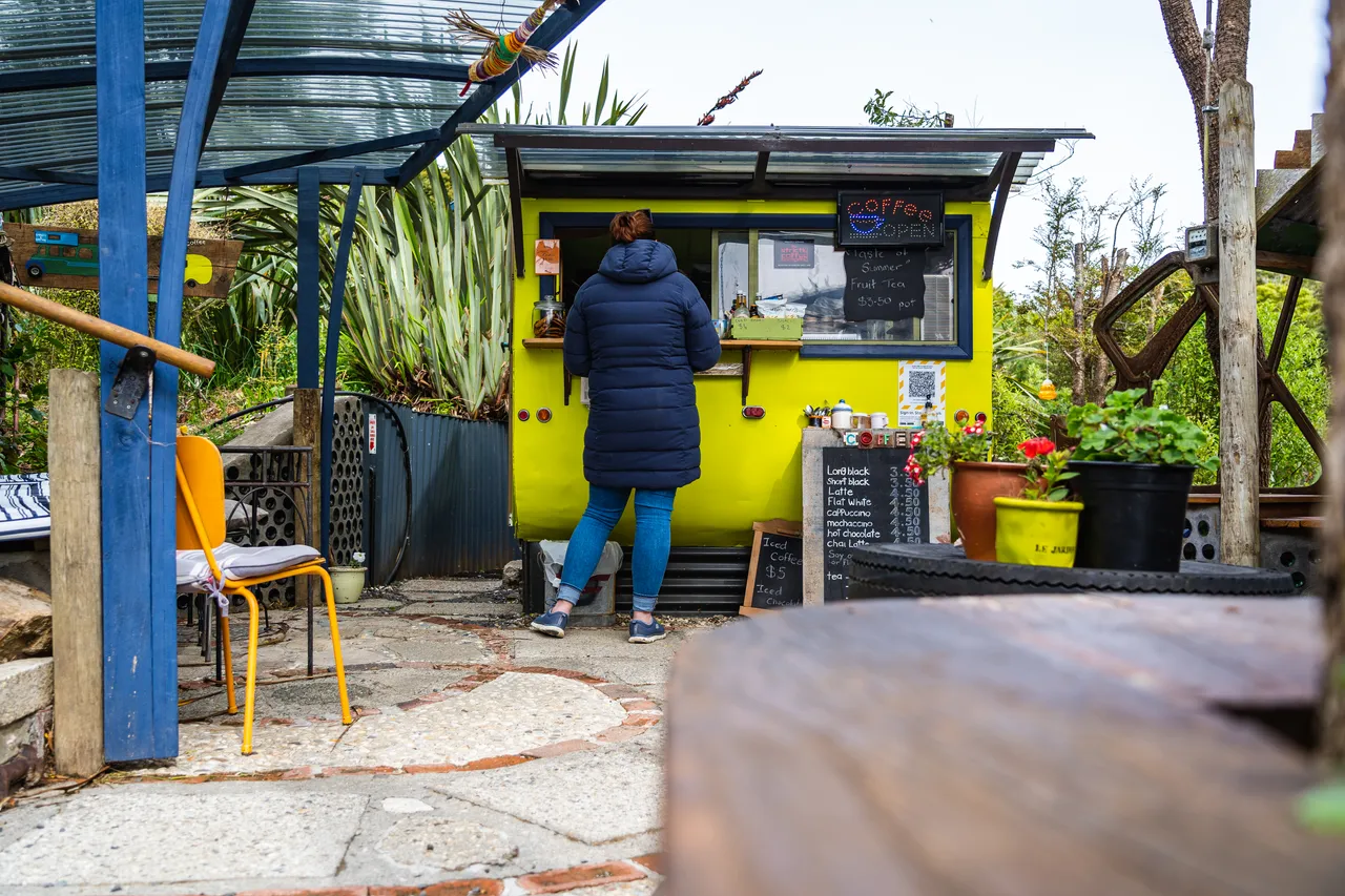 Person outside coffee cart