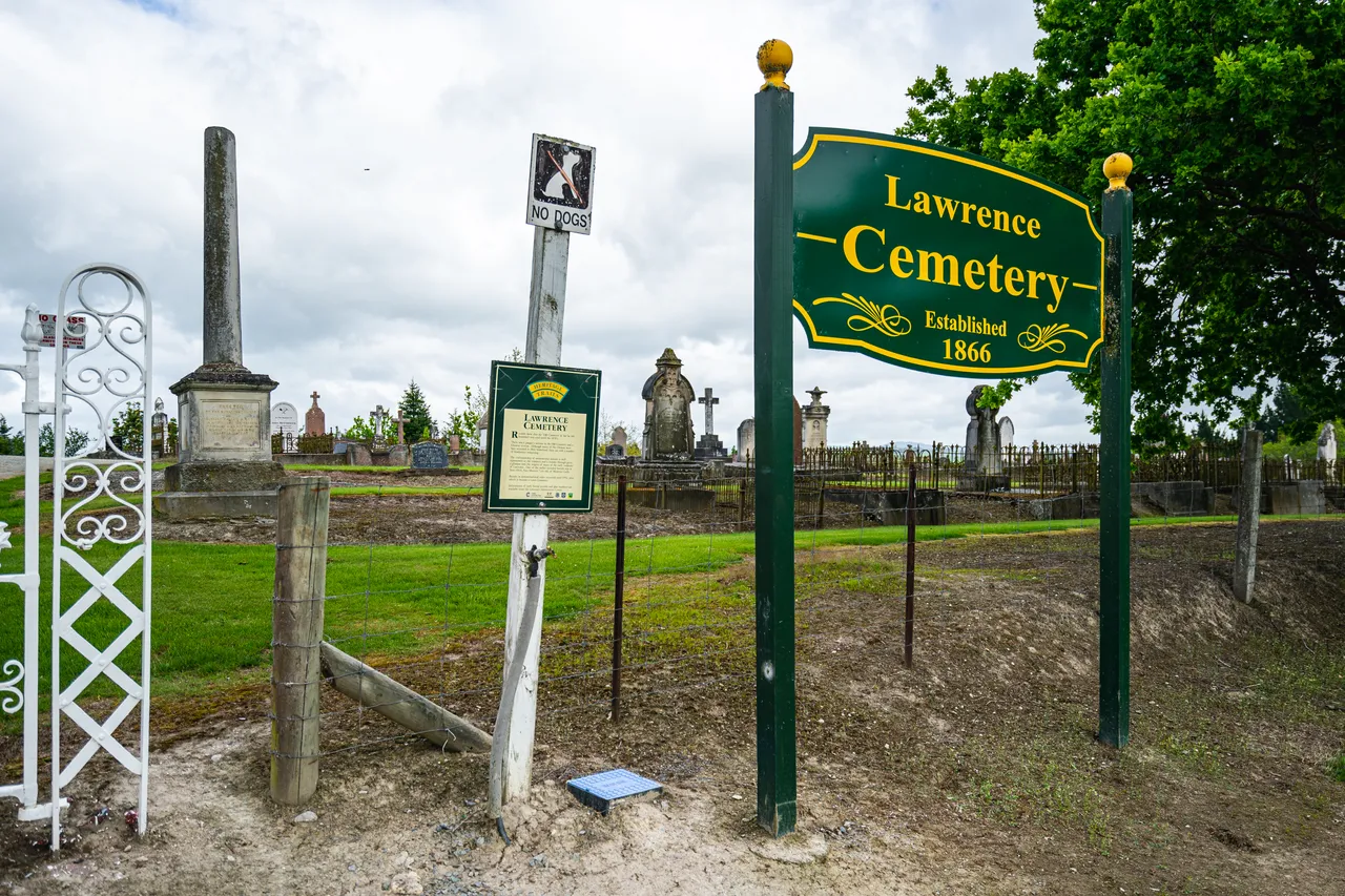 Sign and headstones