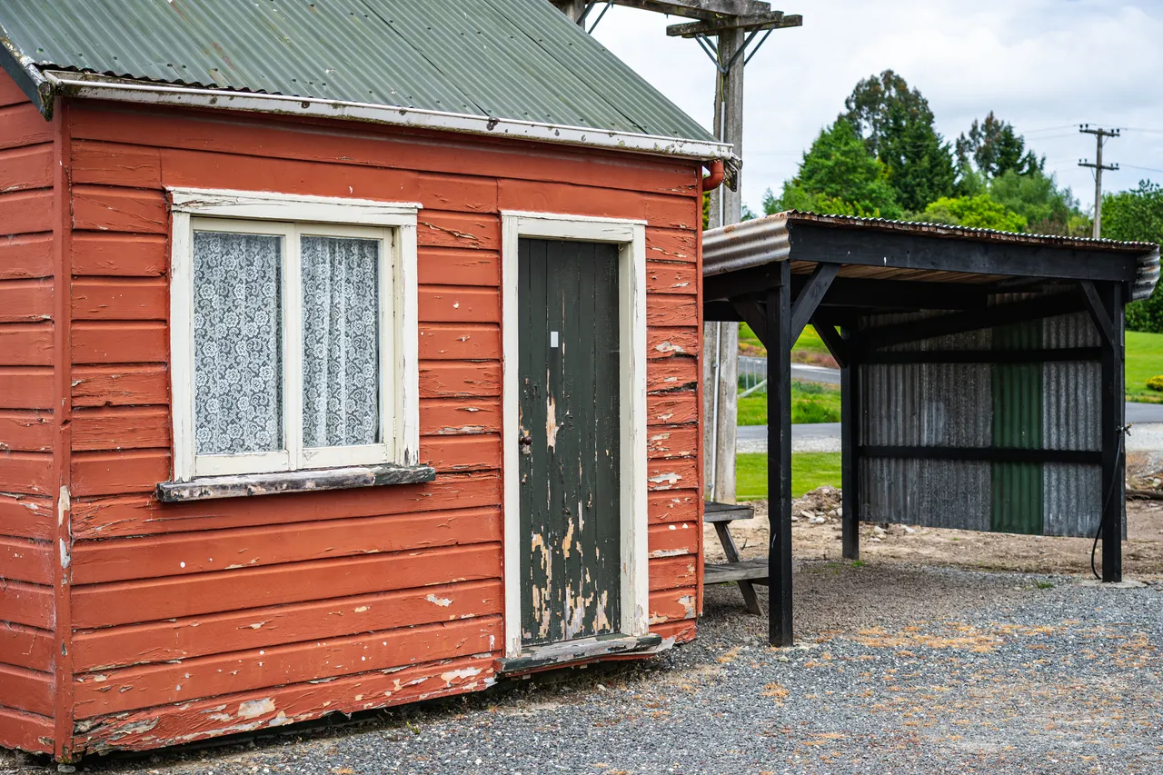 Little red cottage and shed