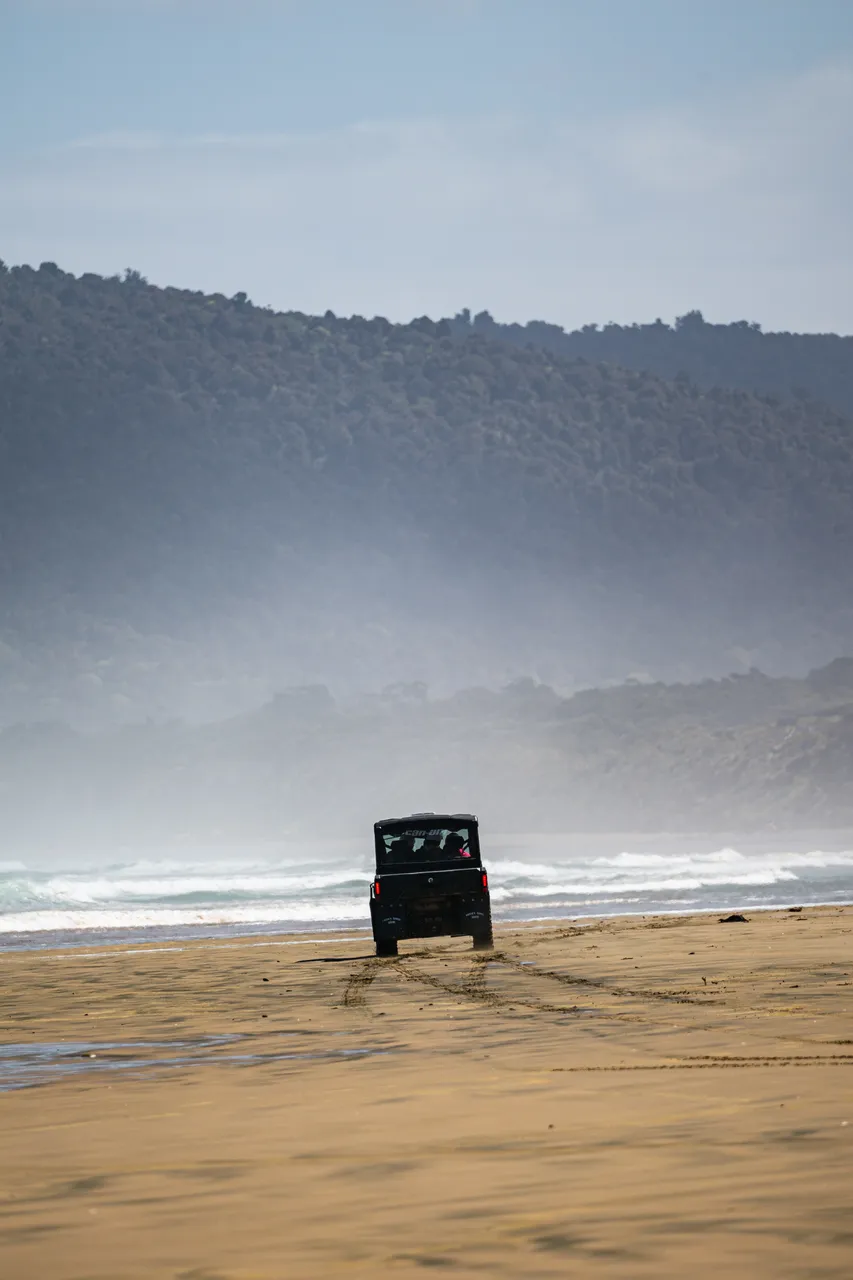 Side by side driving on beach