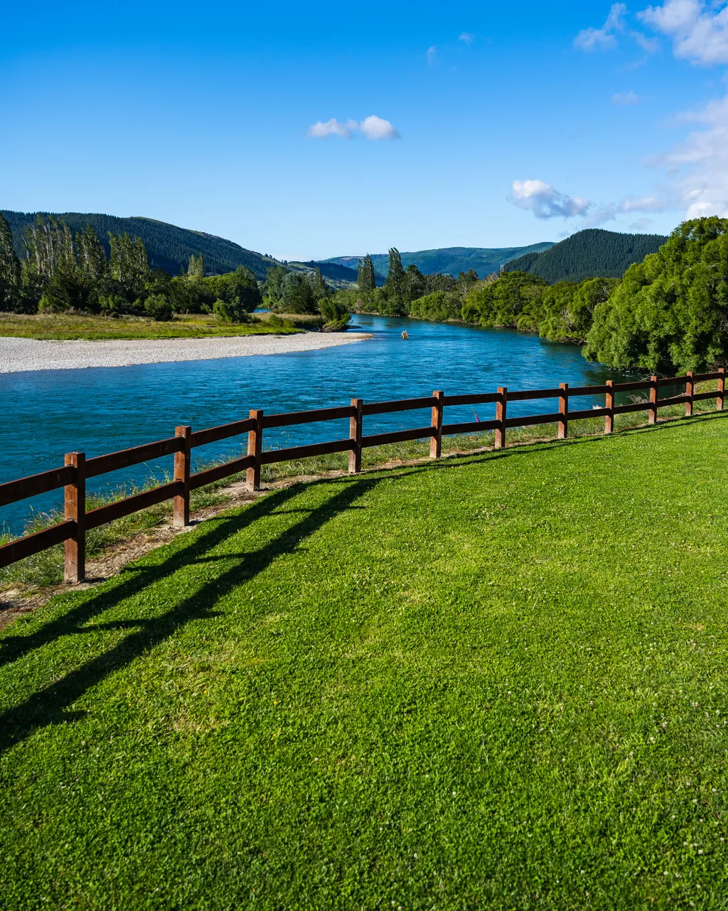 Lawn and fence and river