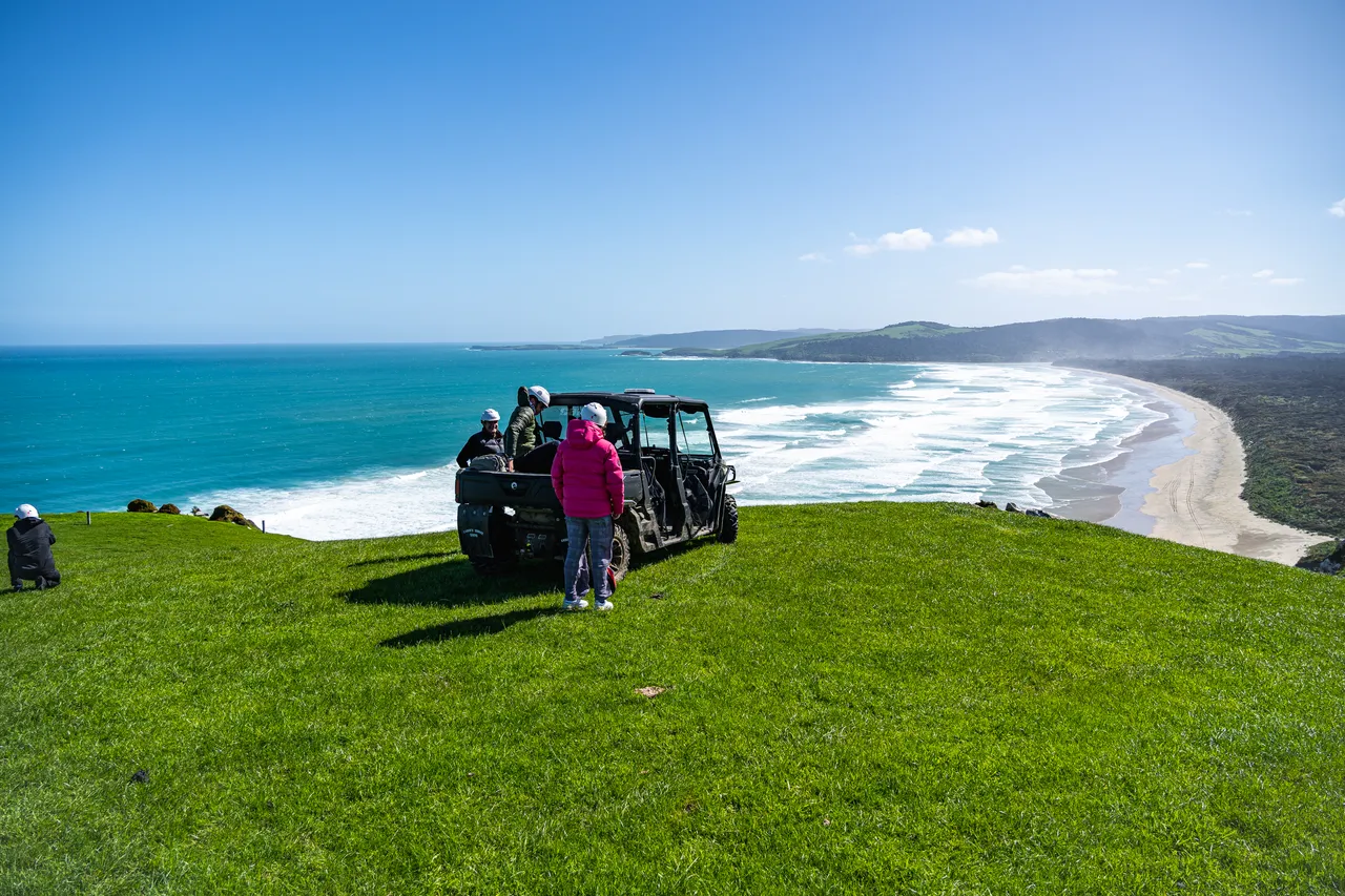 Side by side parked on grass overlooking the sea