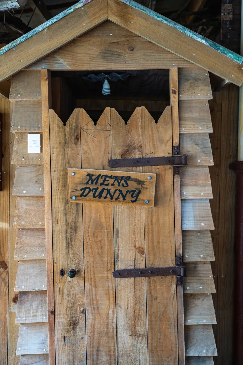 Toilet and sign