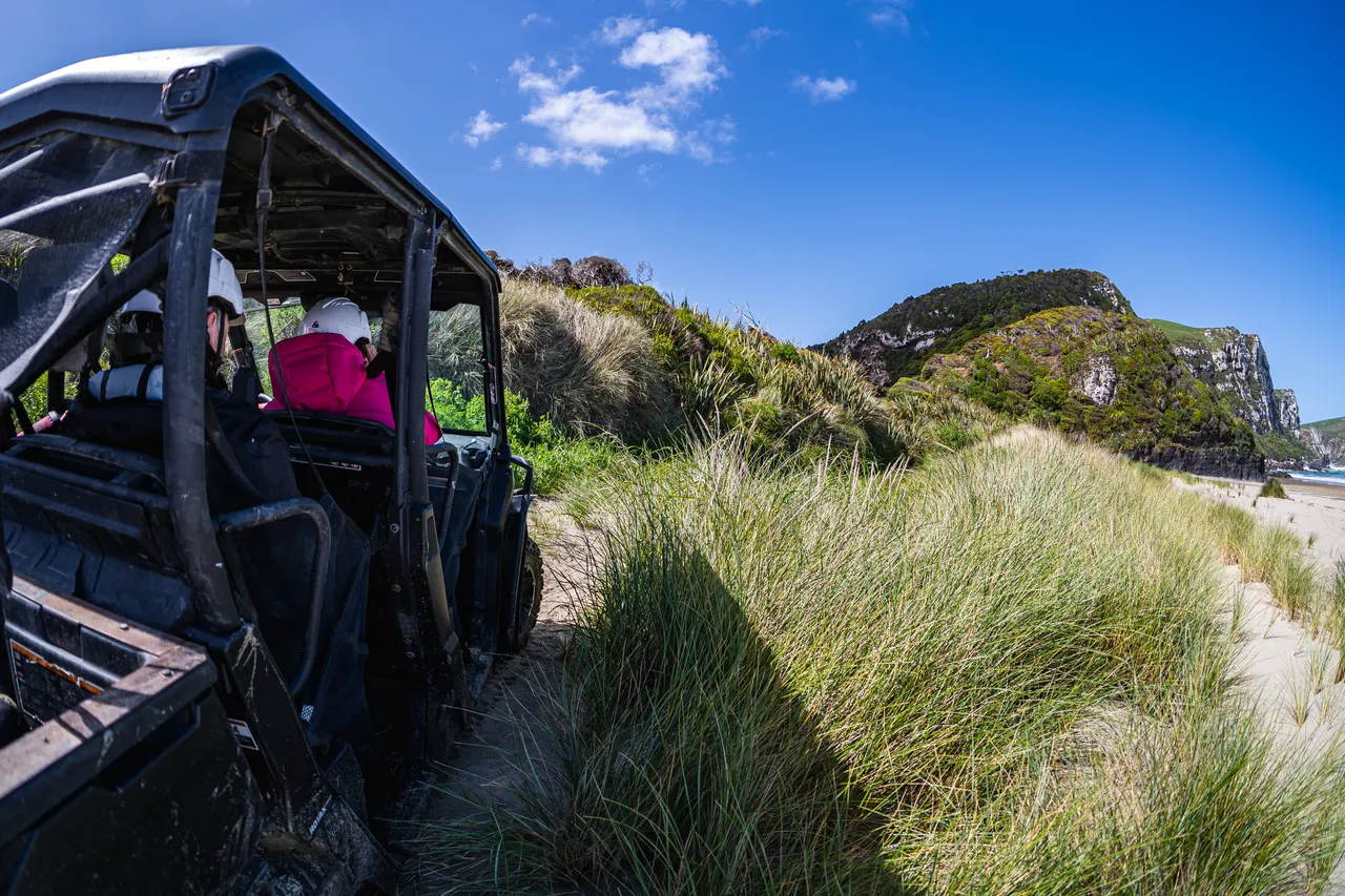Side by side driving on beach