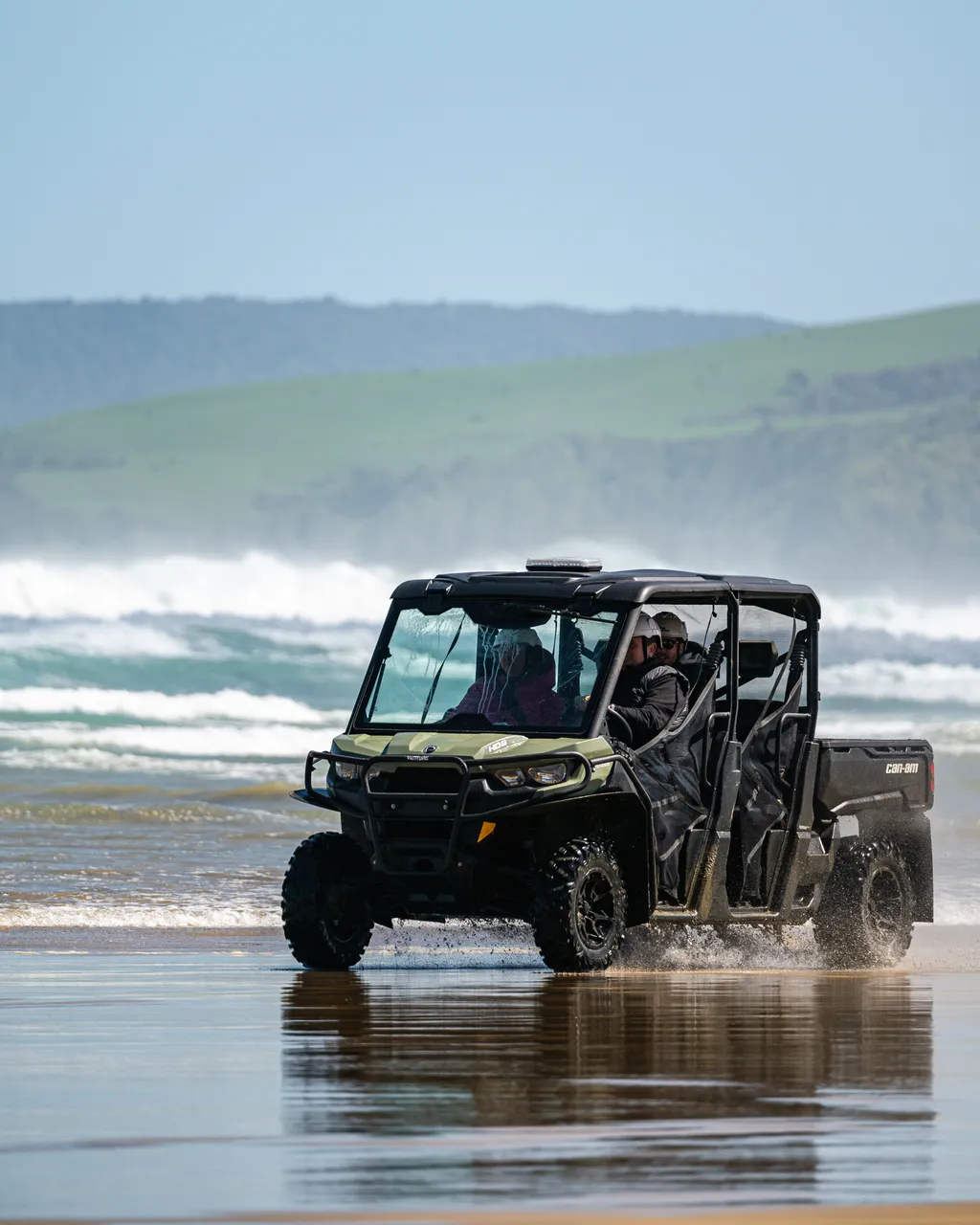 Side by side driving on the beach