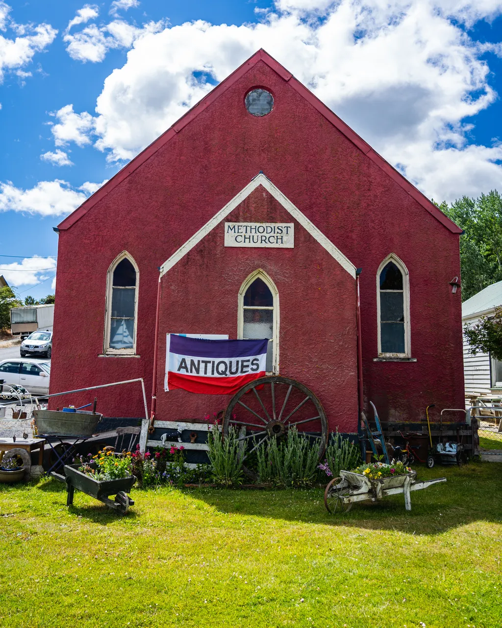 Red building with lawn