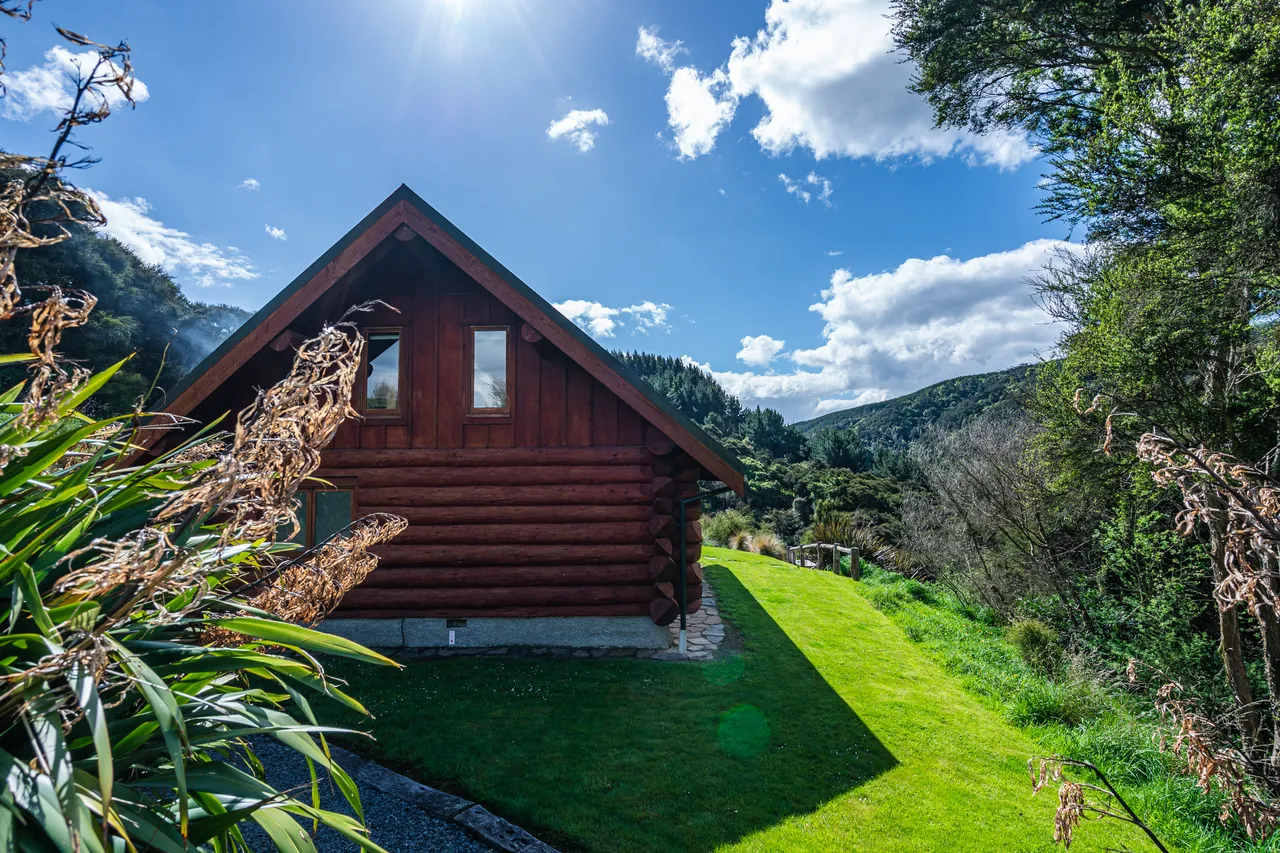 Log cabin on lawn