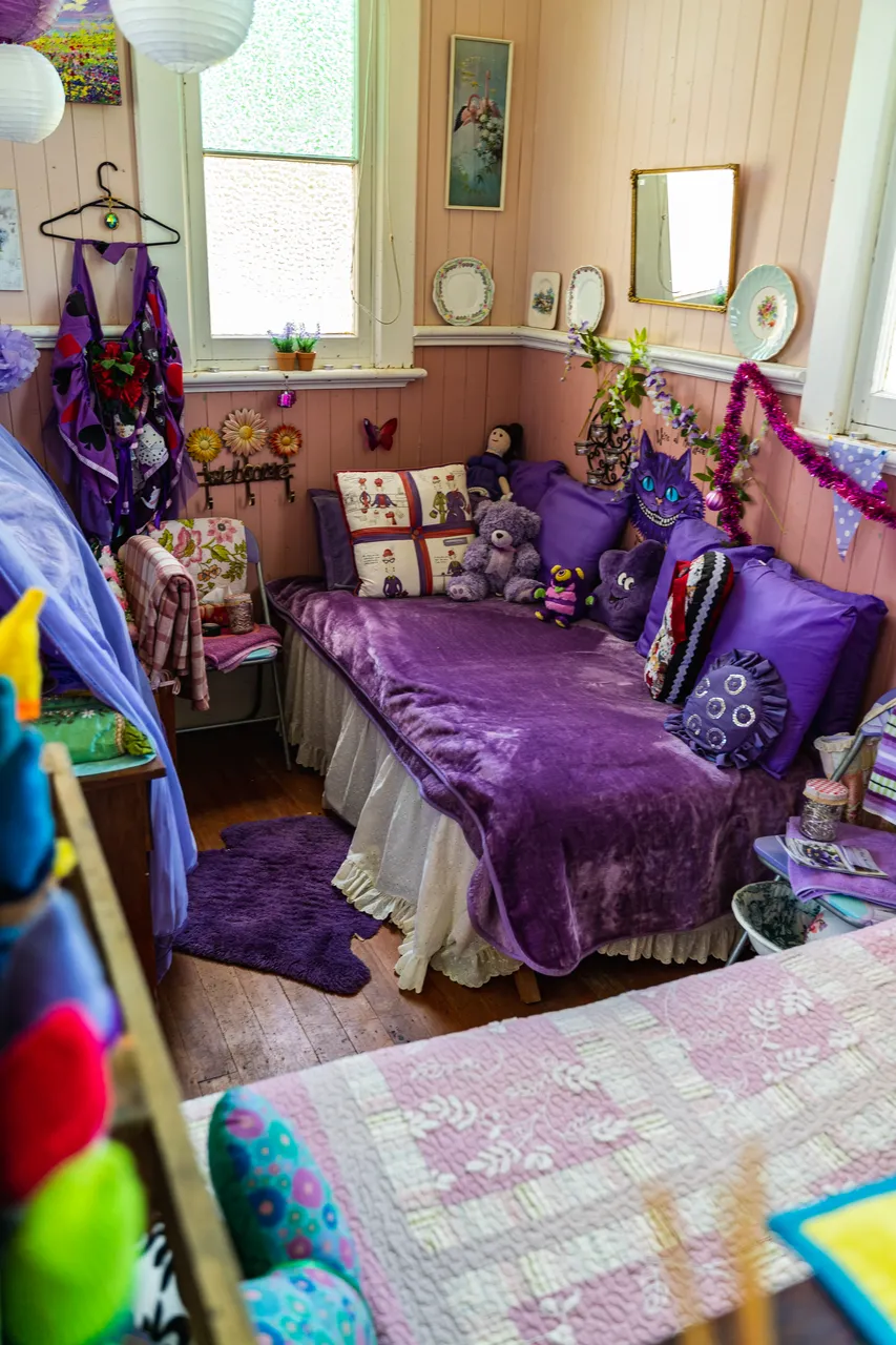 Purple bed with pillows