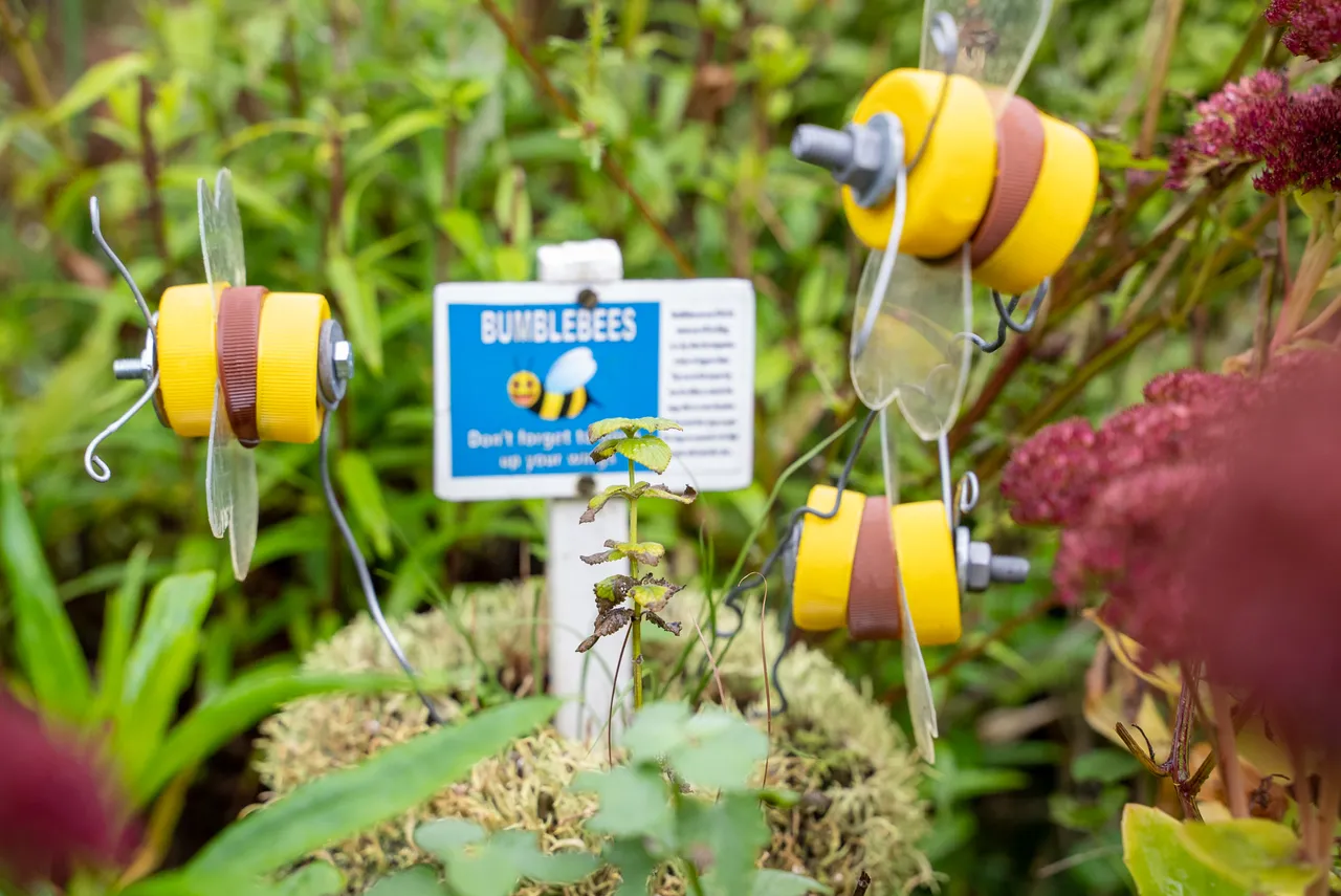Sign and bumblebee art