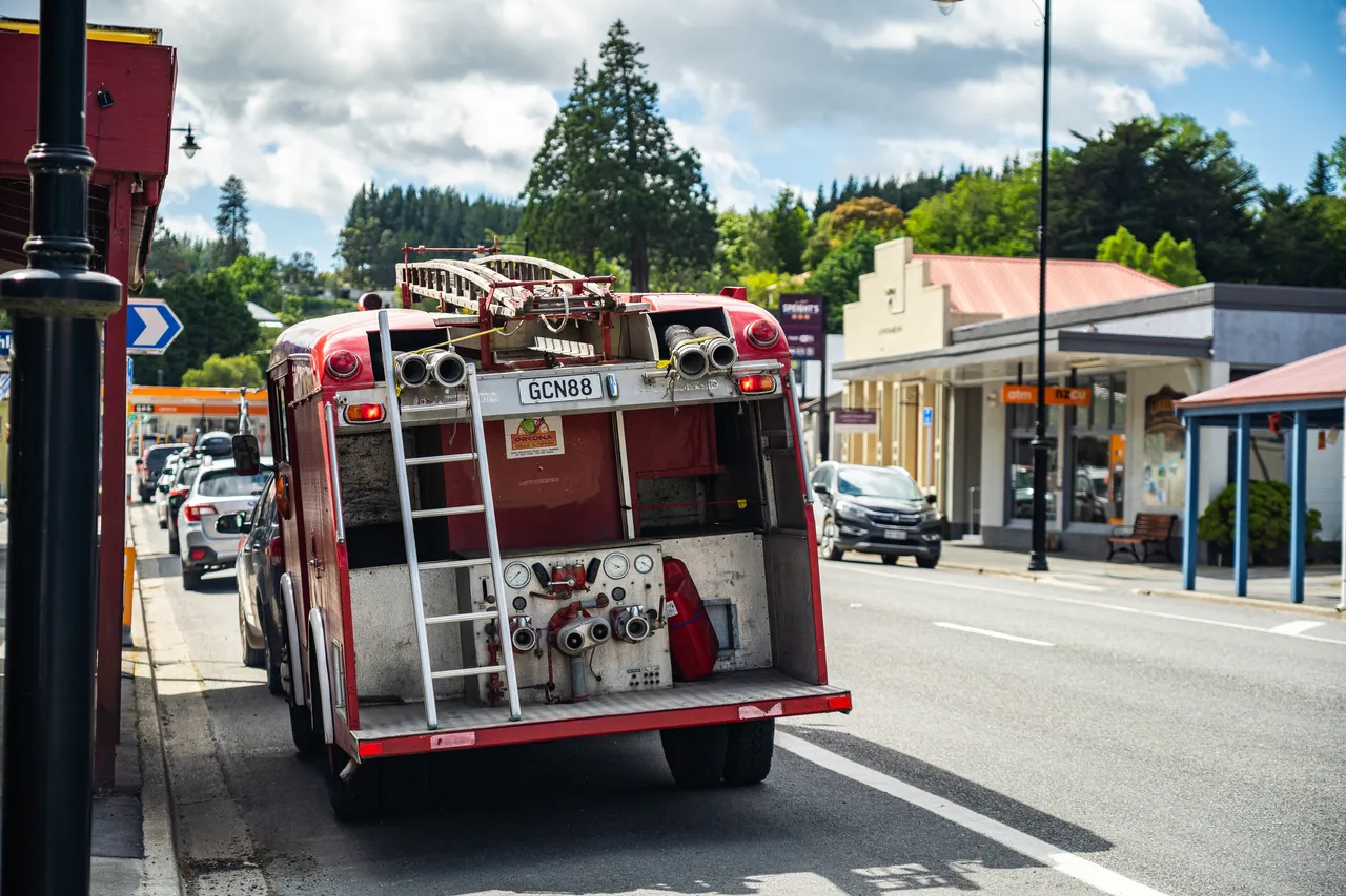 Old firetruck parked on street