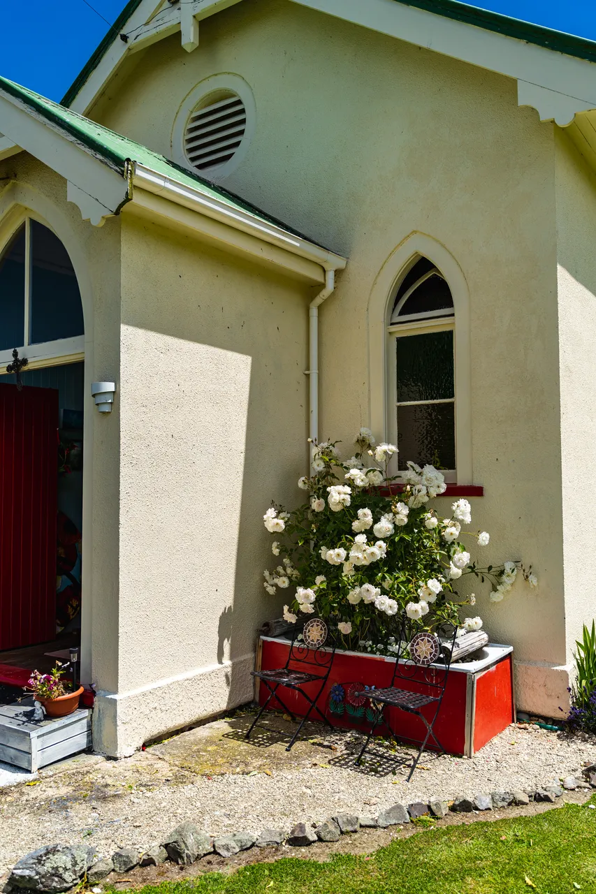 White church and roses