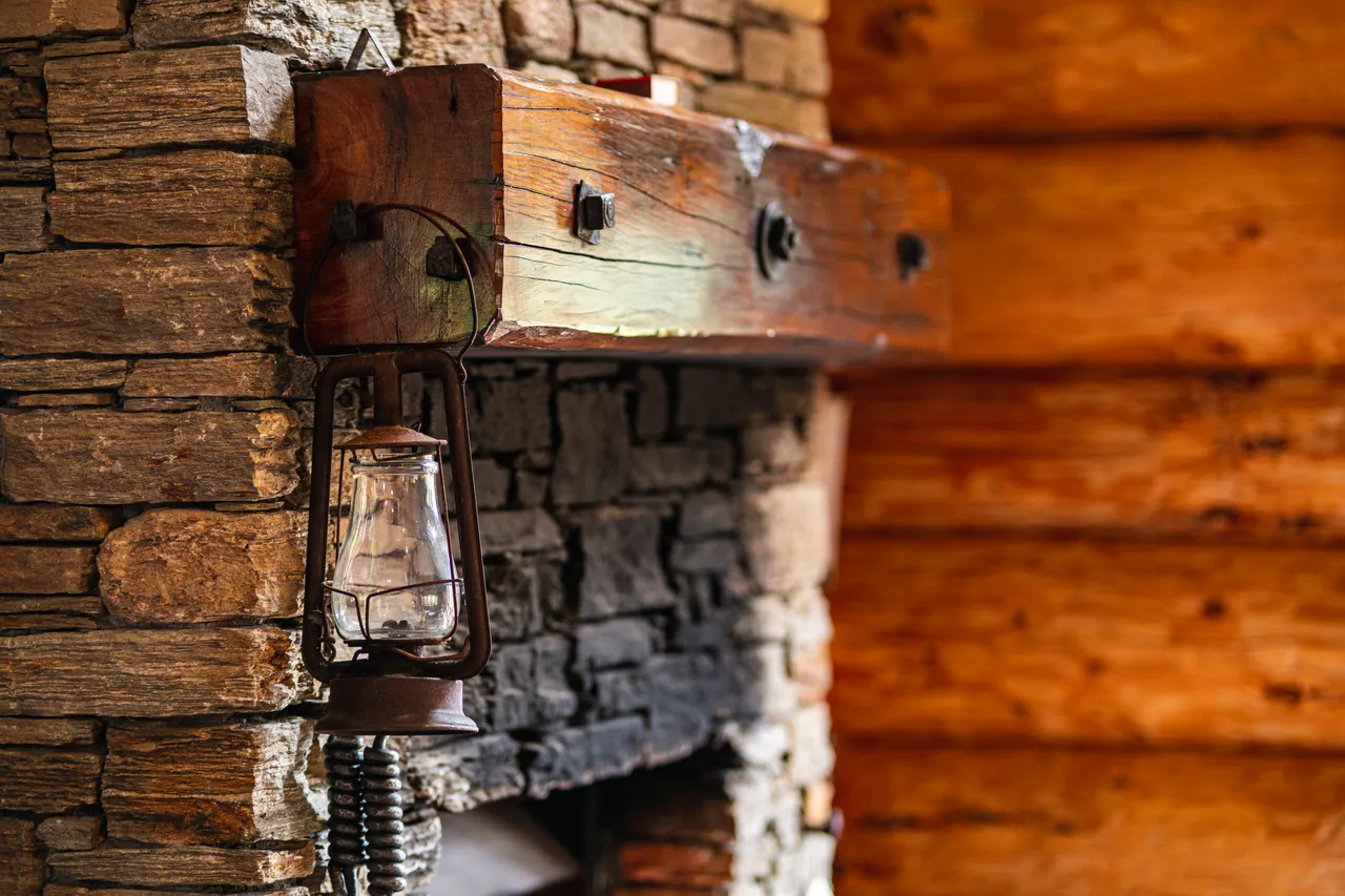 Details of fireplace and lamp