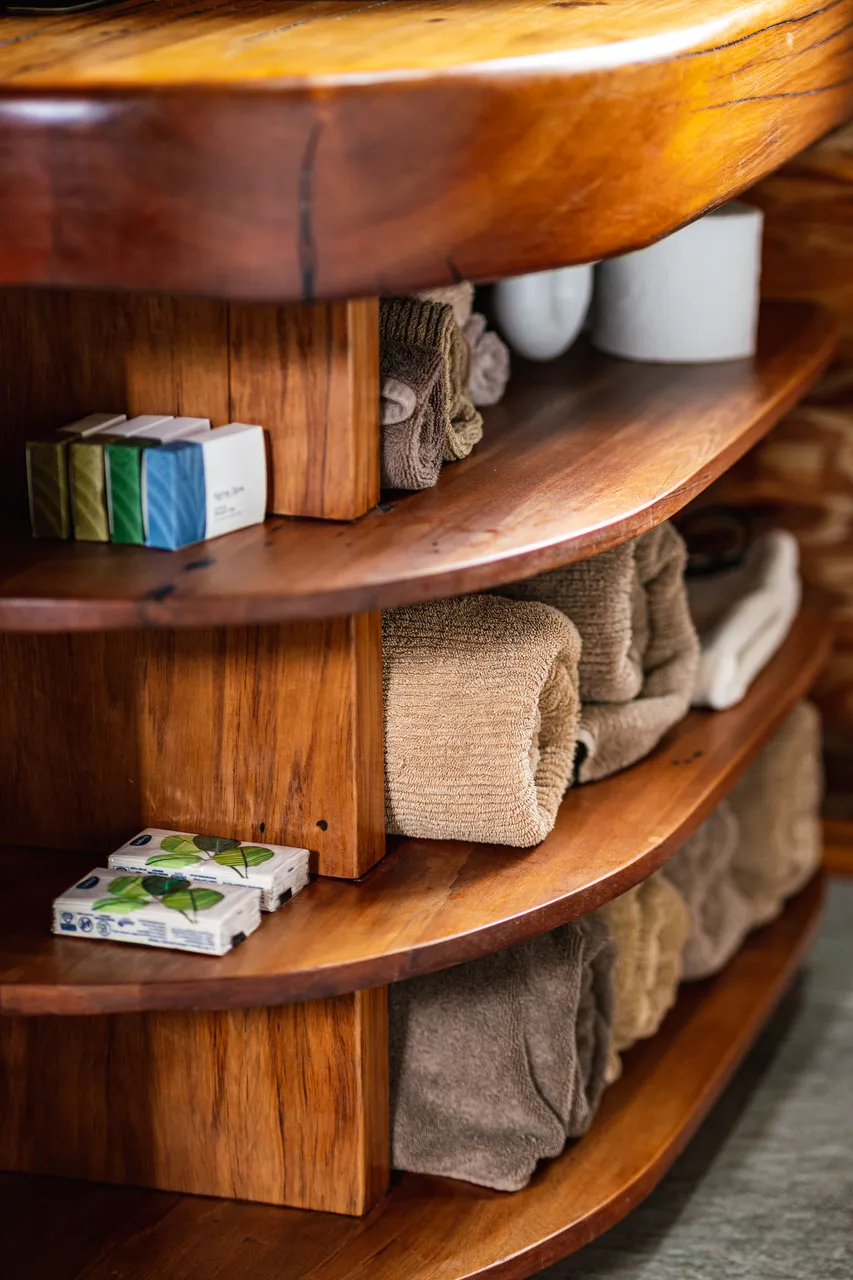 Towels and soaps stored in shelves