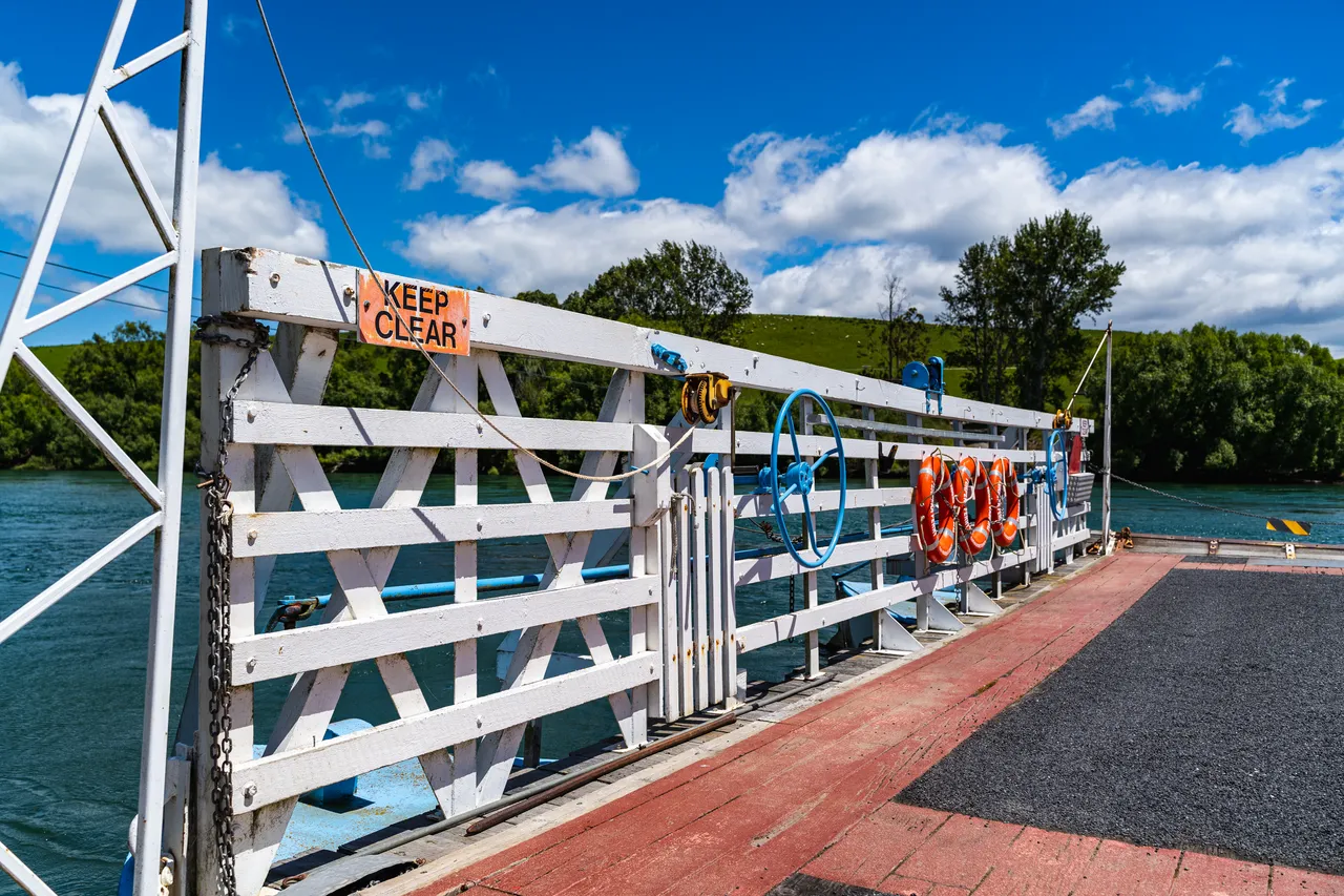 White fence and orange lifebuoys