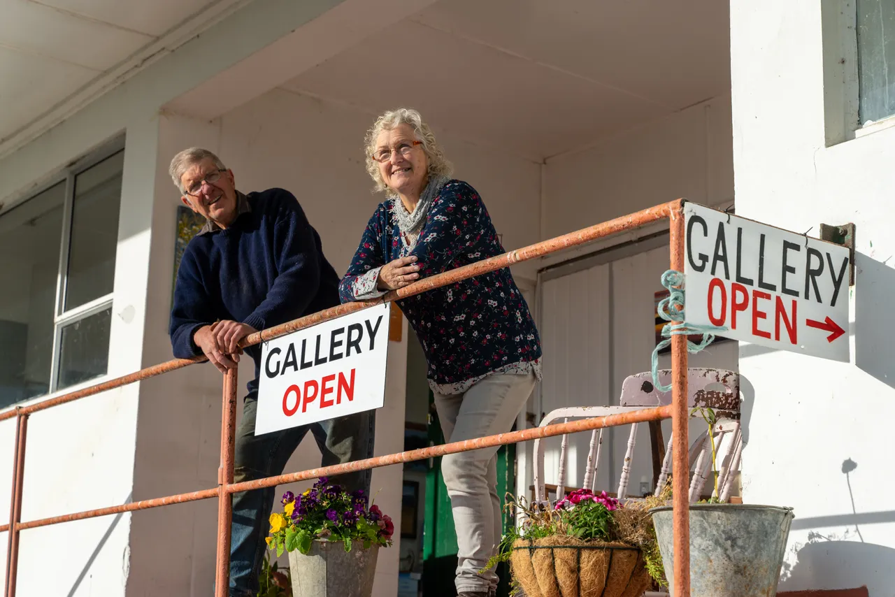 Beth and Peter Linklater in entrance to art gallery
