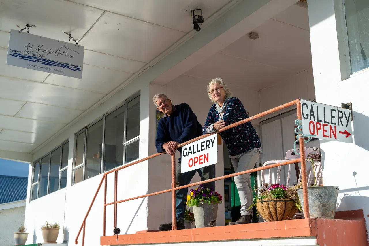 Beth and Peter Linklater in entrance to art gallery
