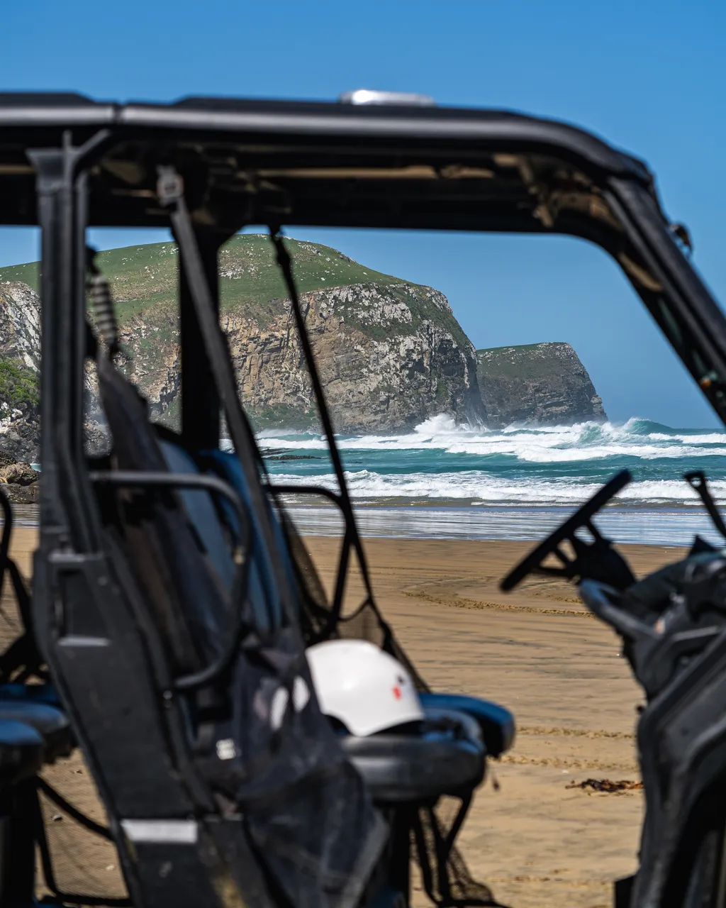 Side by side parked on the beach
