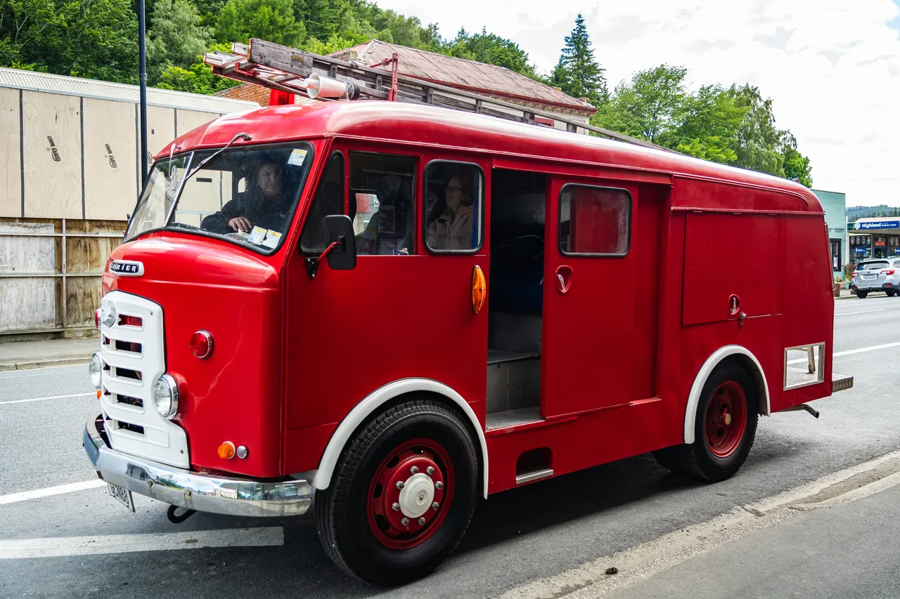 Old firetruck parked on street