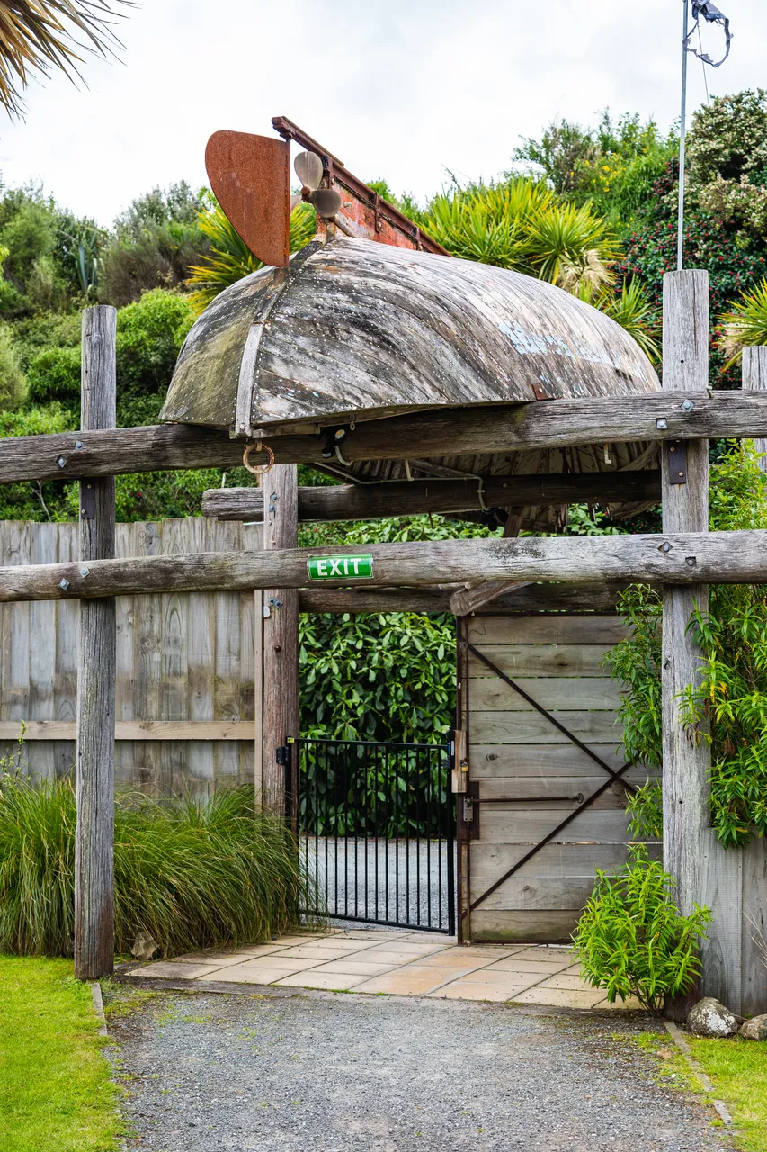 Fence and wooden boat