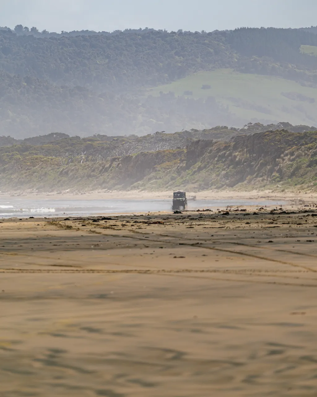 Side by side driving on beach