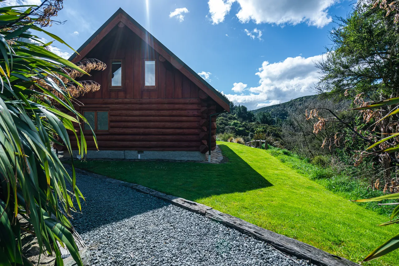 Log cabin on lawn