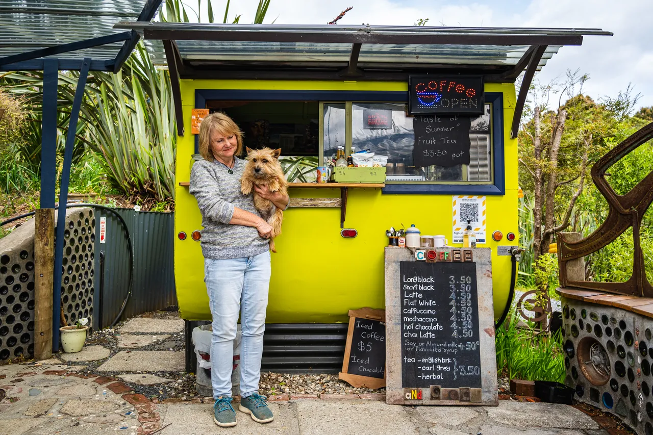 Coffee cart and person and dog