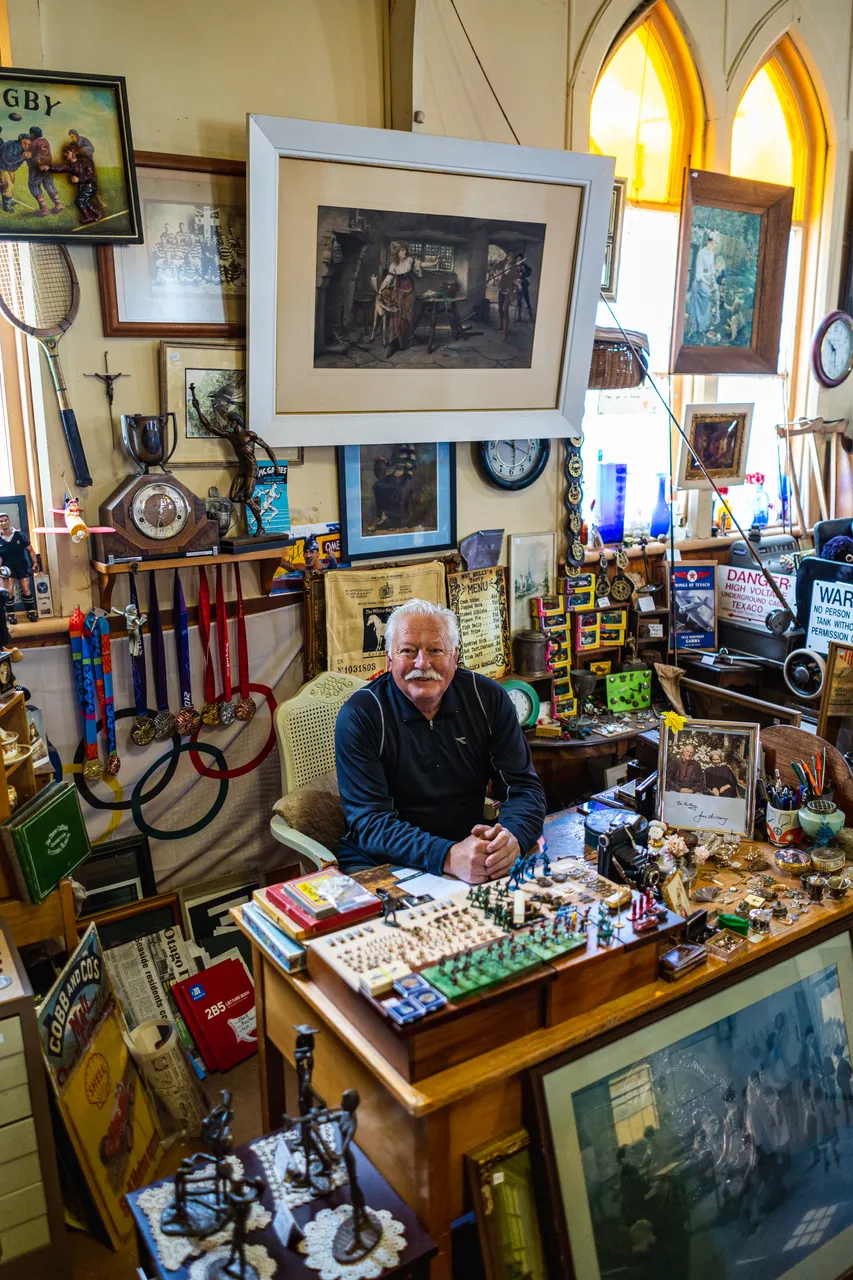 John in antique shop
