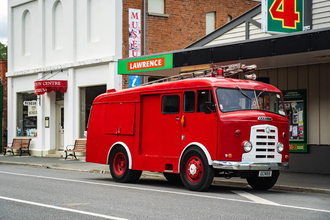 Old firetruck parked on street