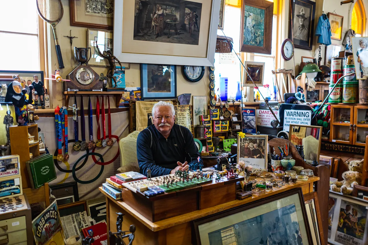 John in antique shop