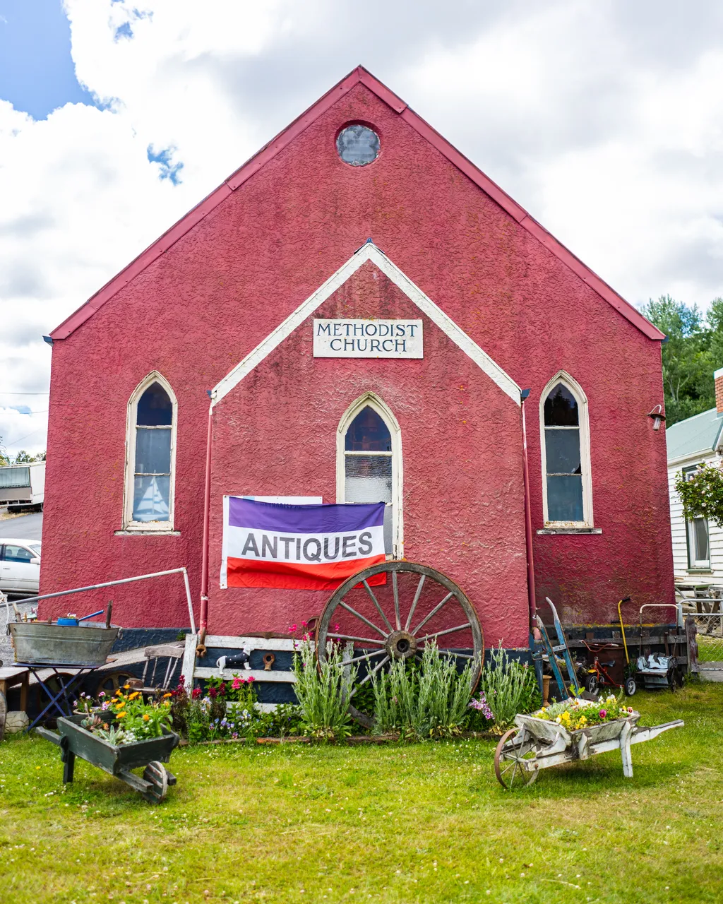 Red building with lawn