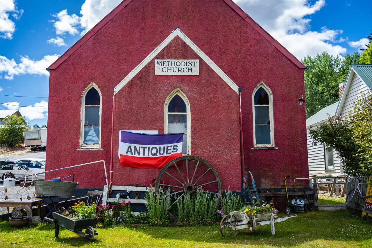 Red building with lawn