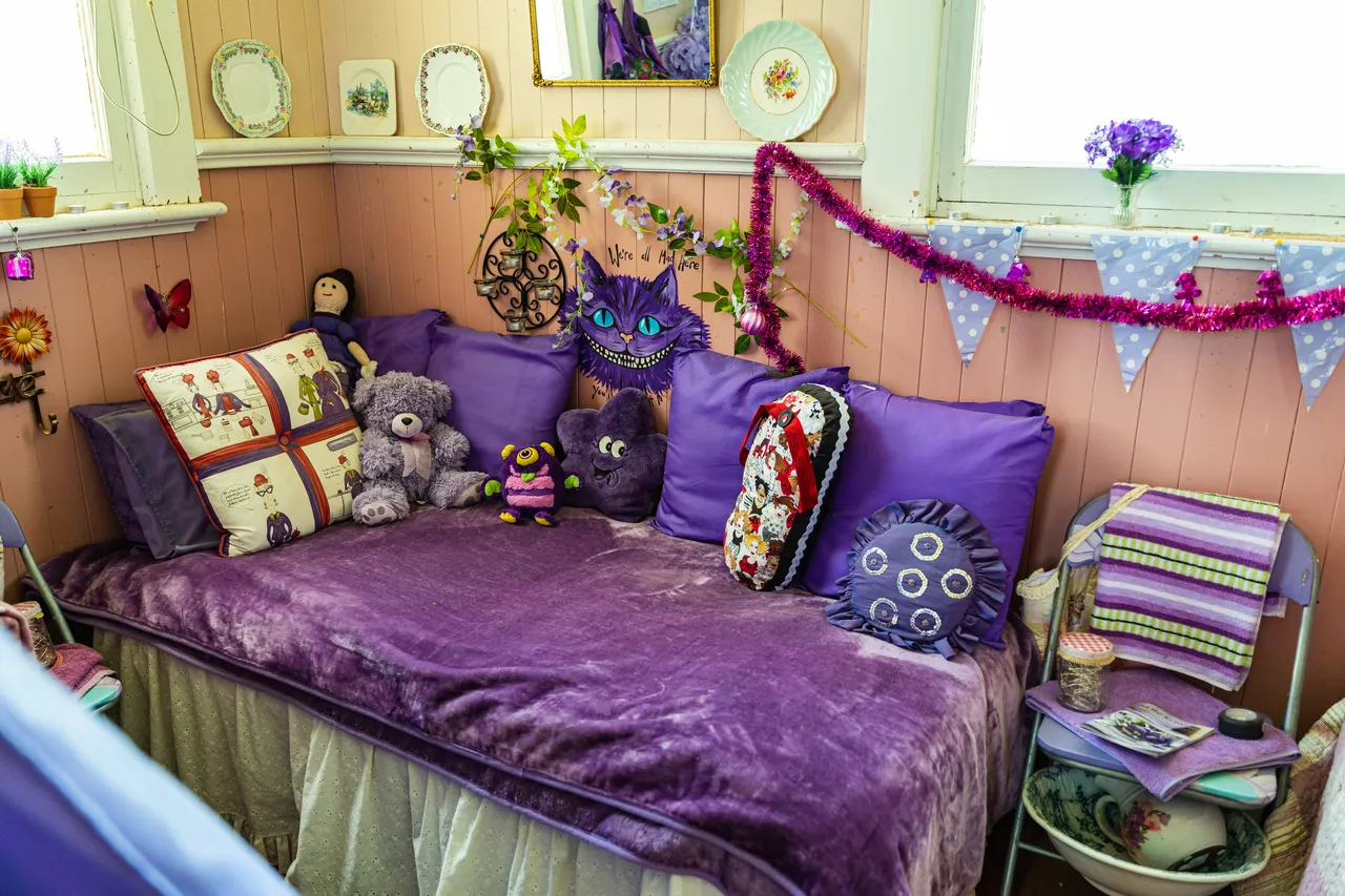 Purple bed with pillows