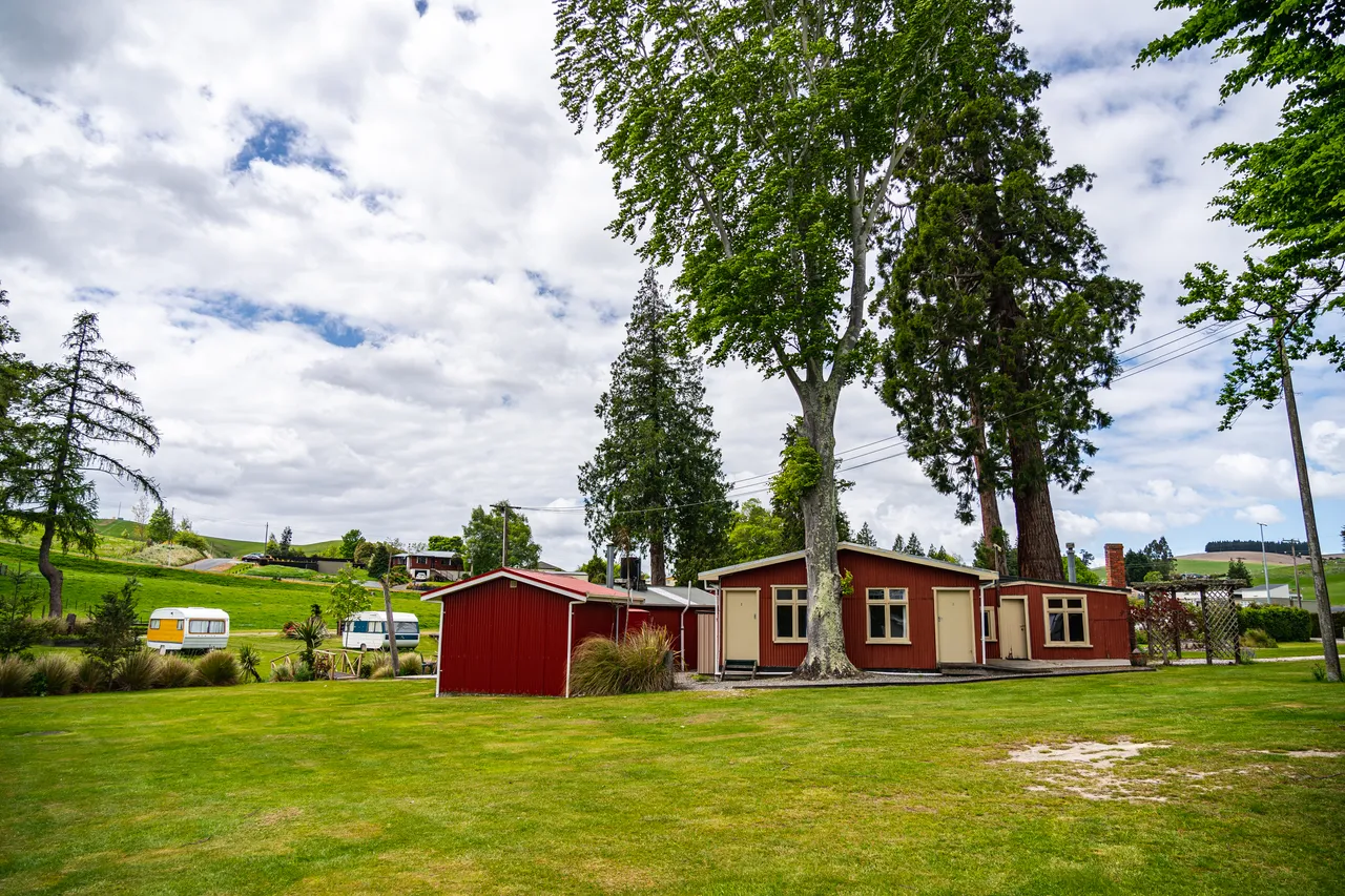 Grass and red buildings