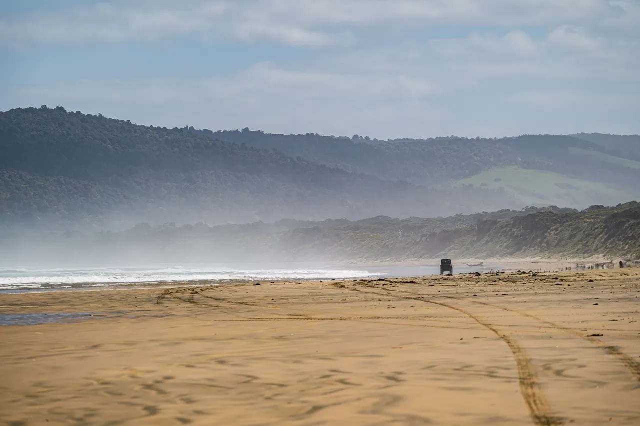 Side by side driving on beach
