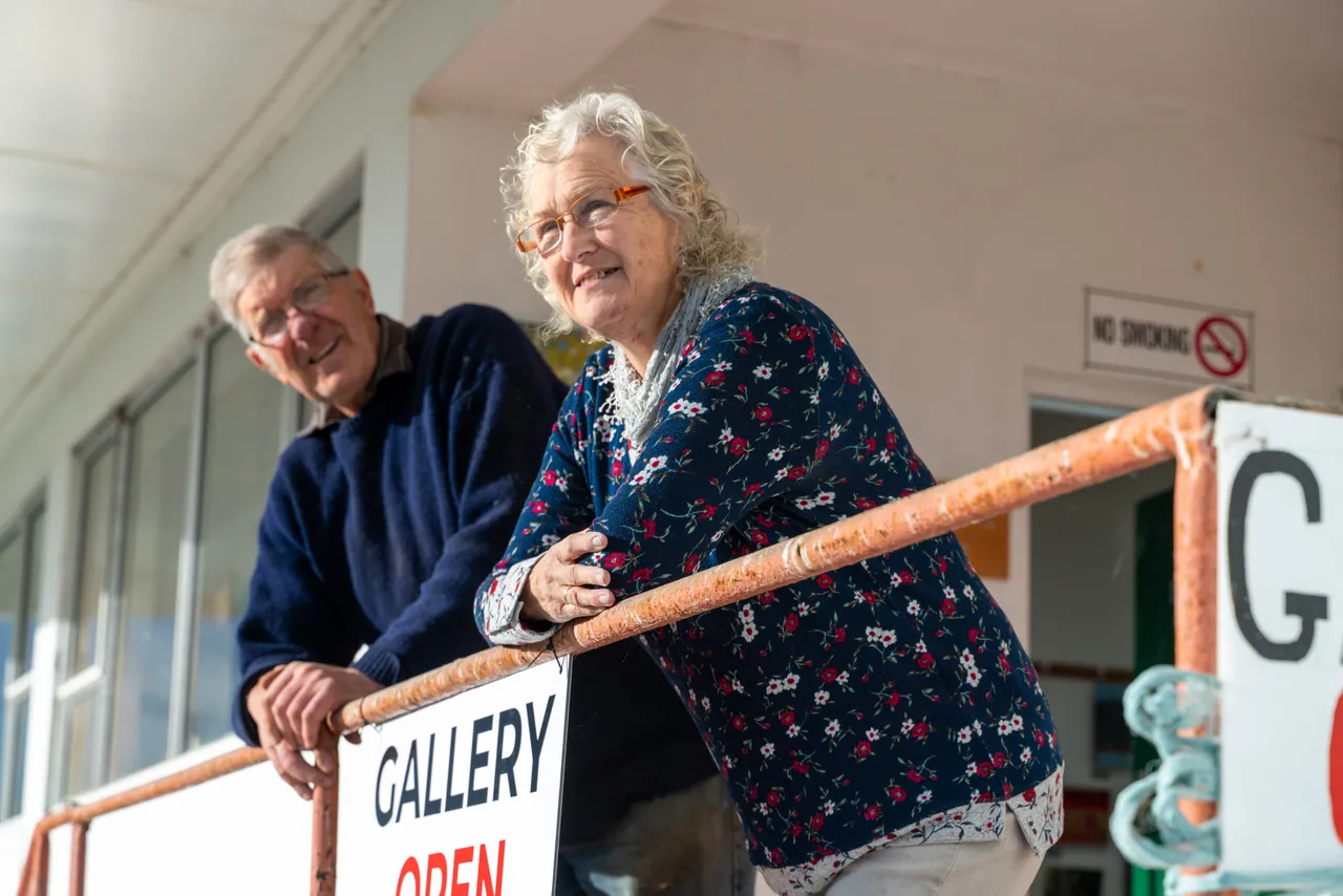 Beth and Peter Linklater in entrance to art gallery